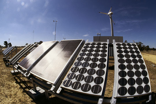 Solar panels and wind turbines at a renewable energy research station in Perth, Western Australia © Richard McLellan / WWF-Canon