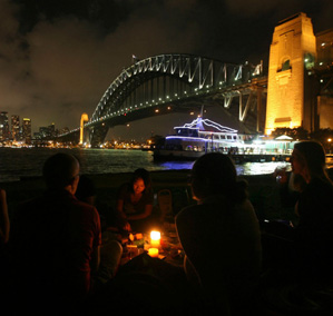 Earth Hour 2010. People celebrating Earth Hour at the Sydney Harbour Bridge, Australia © Dean Sewell / WWF